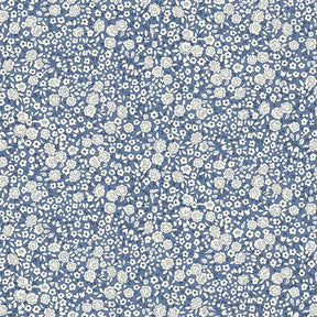 Floral pattern with small white flowers on a blue background